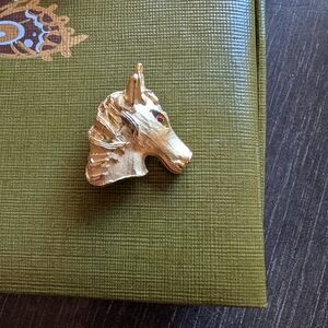 Vintage Gold Horse Brooch with Red Gemstone Eye